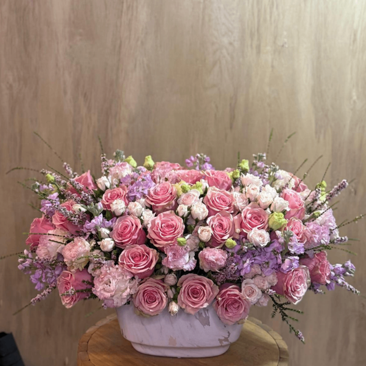 Pink roses lavender stock arrangement