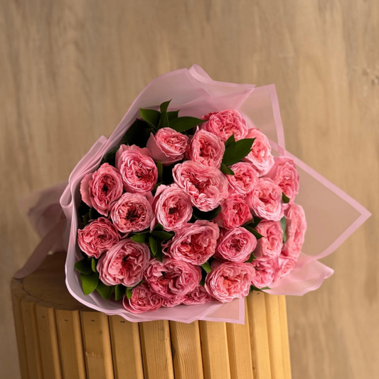 Blush roses in pink tulle wrap