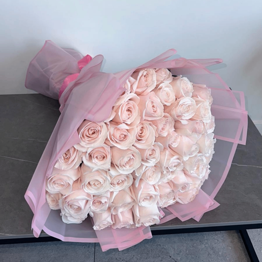 Preserved blush roses gray concrete bowl